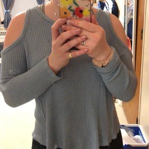 Blue open shouldered long sleeved top